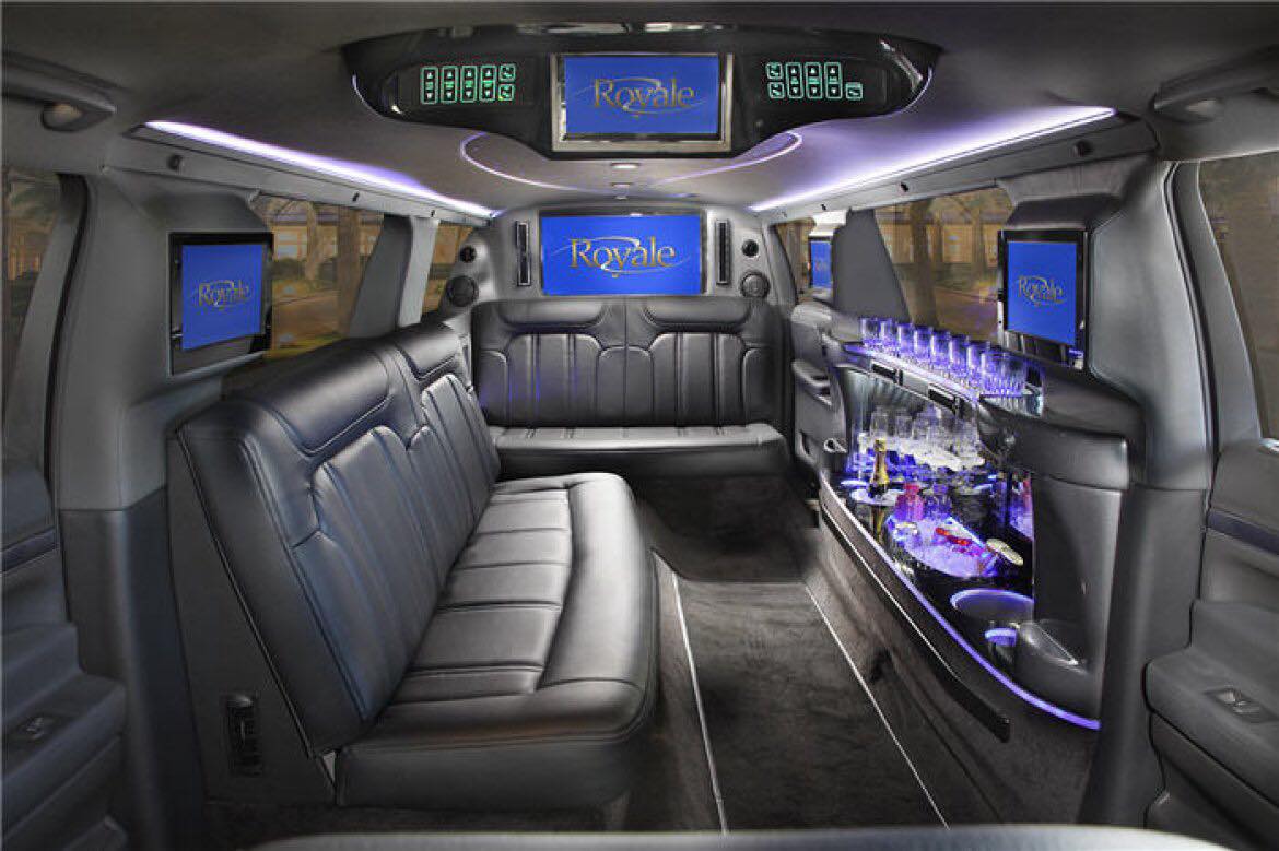 Inside a white limo party bus